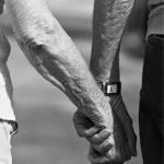 old-couple-holding-hands